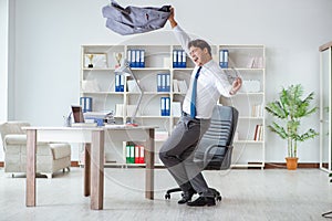 The businessman having fun taking a break in the office at work