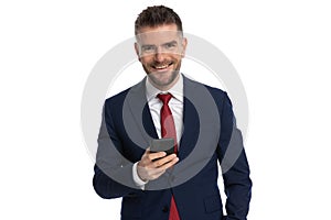 Businessman having a good time chating on the phone