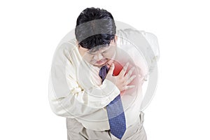Businessman having heart attack