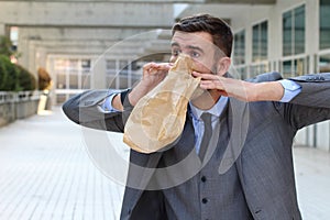 Businessman having a panic attack