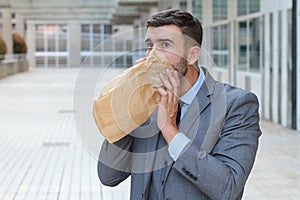 Businessman having a panic attack