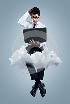 Businessman having problems with cloud computing technology