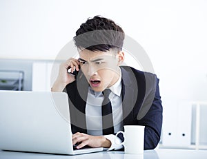 Businessman having stress and surprised in the office