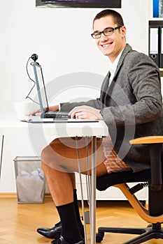 Businessman Having A Teleconference In Shorts