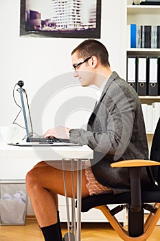 Businessman Having A Teleconference In Shorts