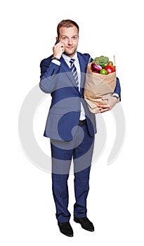 Businessman with healthy food, grocery buyer isolated