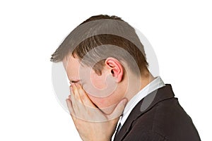 Businessman hiding his face in shame