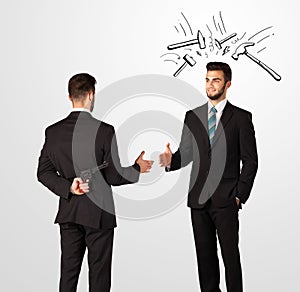 Businessman hiding a weapon