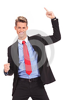 Businessman with his arms widened winning