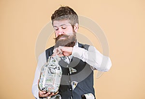 Businessman with his dollar savings. Richness and wellbeing. Security and money savings. Banking concept. Man bearded