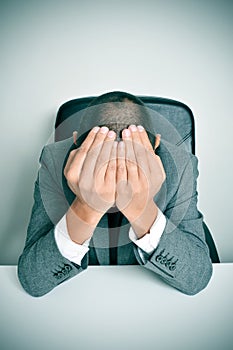 Businessman with his hands in his head