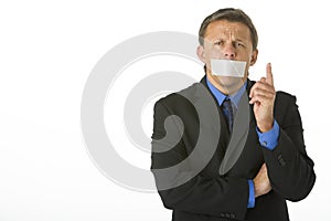 Businessman With His Mouth Taped Shut