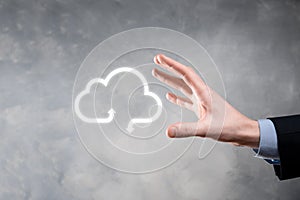 Businessman hold cloud icon.Cloud computing concept - connect smart phone to cloud. computing network information technologist