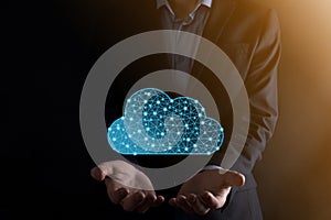 Businessman hold cloud icon.Cloud computing concept - connect smart phone to cloud. computing network information technologist