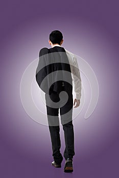 Businessman hold coat