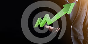 Businessman hold drawing on screen growing graph, arrow of positive growth icon.pointing at creative business chart with upward