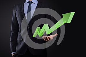 Businessman hold drawing on screen growing graph, arrow of positive growth icon.pointing at creative business chart with upward