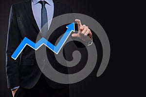 Businessman hold drawing on screen growing graph, arrow of positive growth icon.pointing at creative business chart with upward