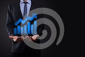 Businessman hold drawing on screen growing graph, arrow of positive growth icon.pointing at creative business chart with upward