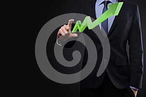 Businessman hold drawing on screen growing graph, arrow of positive growth icon.pointing at creative business chart with upward