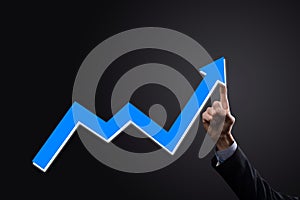 Businessman hold drawing on screen growing graph, arrow of positive growth icon.pointing at creative business chart with upward