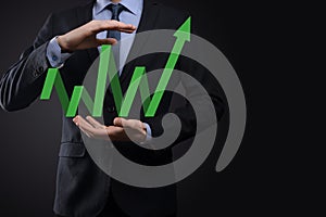 Businessman hold drawing on screen growing graph, arrow of positive growth icon.pointing at creative business chart with upward