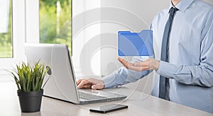 Businessman hold folder icon.Document Management System or DMS setup by IT consultant with modern computer are searching managing