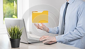 Businessman hold folder icon.Document Management System or DMS setup by IT consultant with modern computer are searching managing