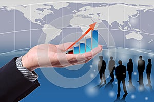 Businessman hold a growth graph