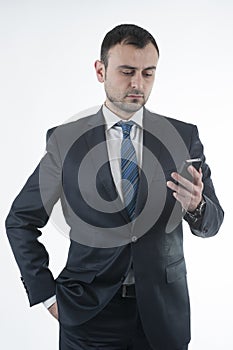 Businessman hold mobile phone on his hand