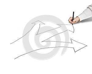Businessman hold pen drawing 3 ways with arrow for direction
