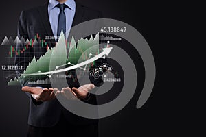 Businessman hold sales data and economic growth graph chart. Business planning and strategy. Analysing trading of exchange.
