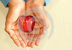 Businessman holding apple