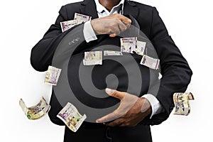 Businessman holding black bag full of 200 Namibian dollar notes isolated on white background