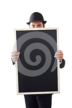 Businessman holding a blackboard.