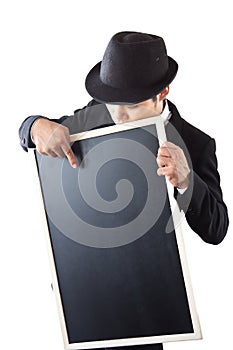 Businessman holding a blackboard.