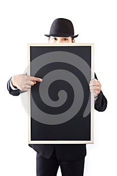 Businessman holding a blackboard.