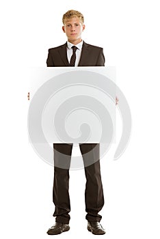 Businessman holding blank banner