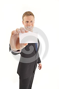 Businessman holding blank business card