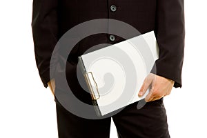 Businessman holding a blank notepad