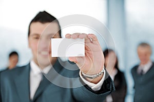 Businessman holding blank sign