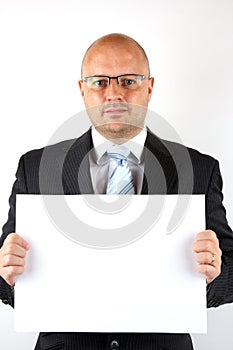 Businessman holding a blank sign