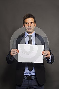 Businessman Holding a Blank Sign