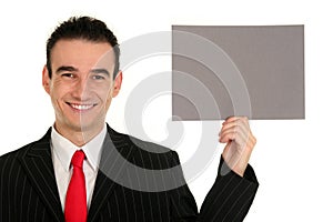 Businessman Holding Blank Sign