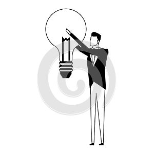 Businessman holding bulb in black and white