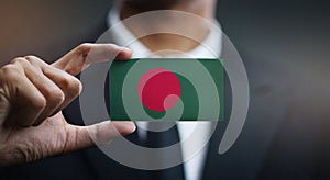 Businessman Holding Card of Bangladesh Flag