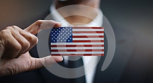 Businessman Holding Card of United States of America Flag