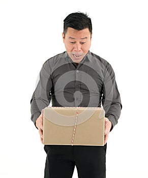 Businessman Holding Cardboard Box Isolated On White Background