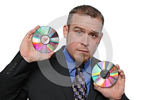 Businessman holding CDs