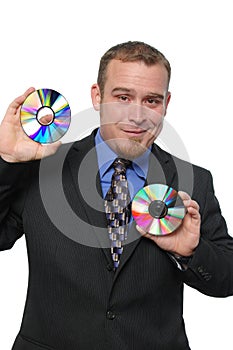 Businessman holding CDs
